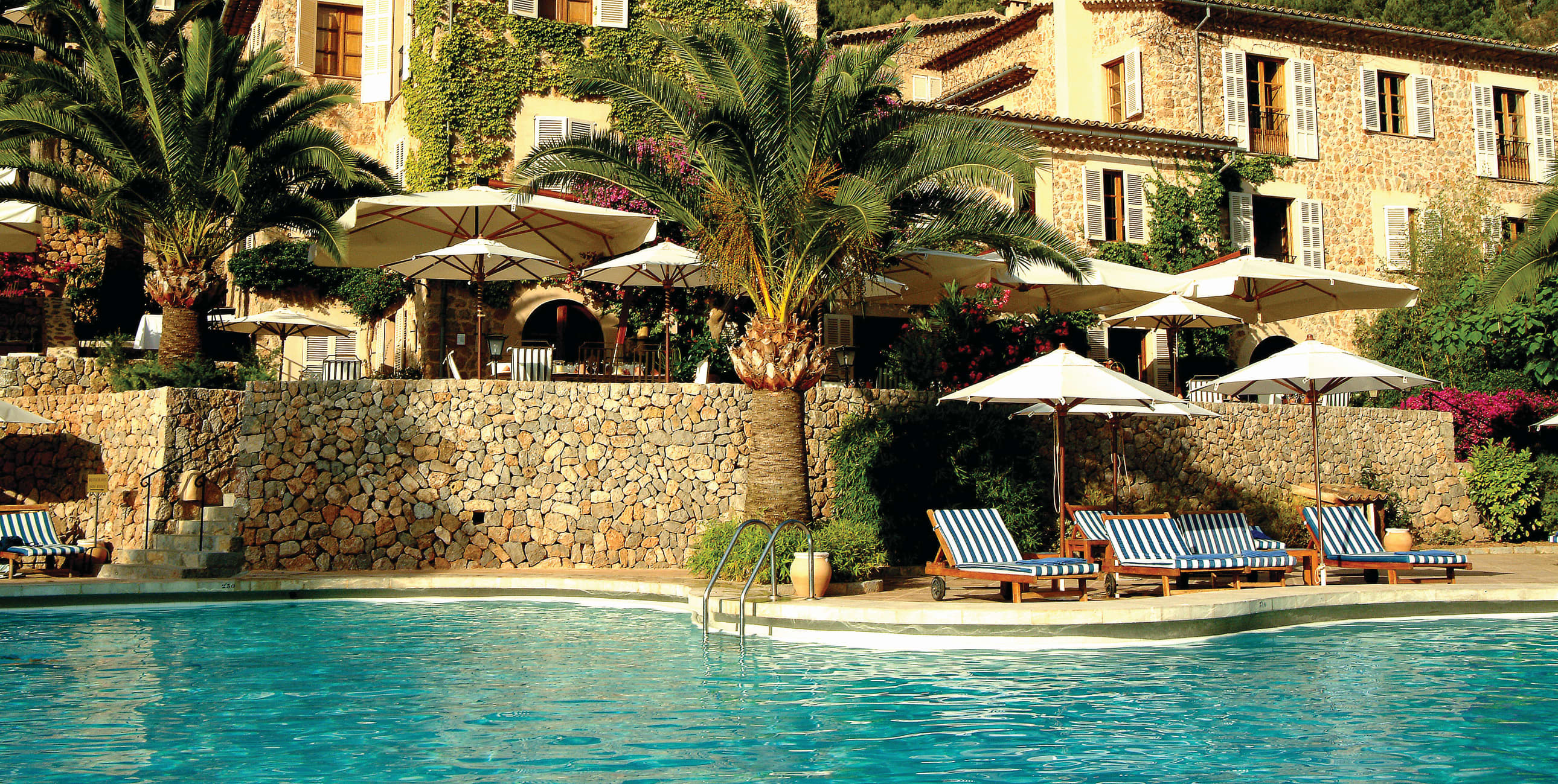 La Residencia — the honey-coloured stone facade of the Belmond hotel above Deià, Mallorca