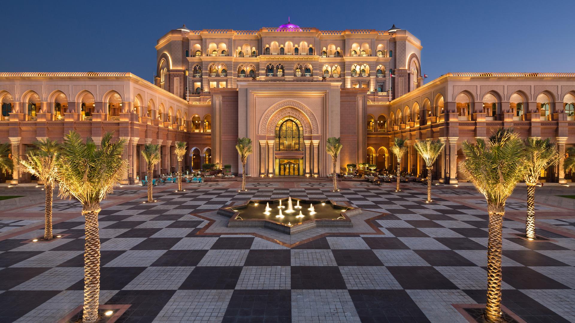 Emirates Palace Mandarin Oriental, Abu Dhabi — illuminated palace courtyard at dusk
