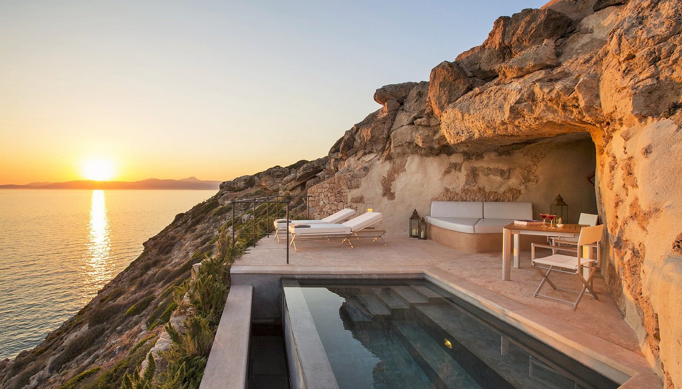 Sentinel terrace at Cap Rocat, Mallorca — private plunge pool carved into the clifftop at sunset